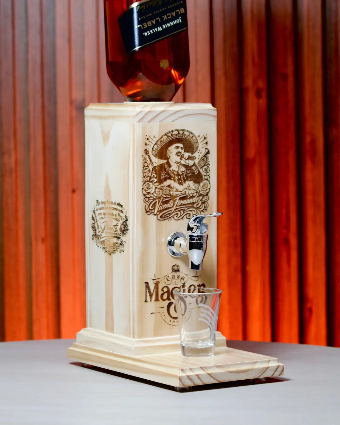 Dispensador de licor tributo cantantes